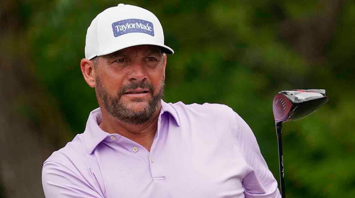 Michael Block watches his shot from the sixth tee during the first round of the 2023 Charles Schwab Challenge.